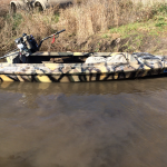 boat with Stump-Jumper mud motor